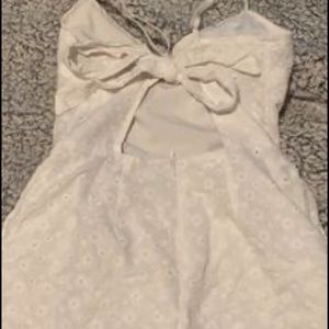 from tillys, it’s a white flowed romper, i just don’t use it anymore!